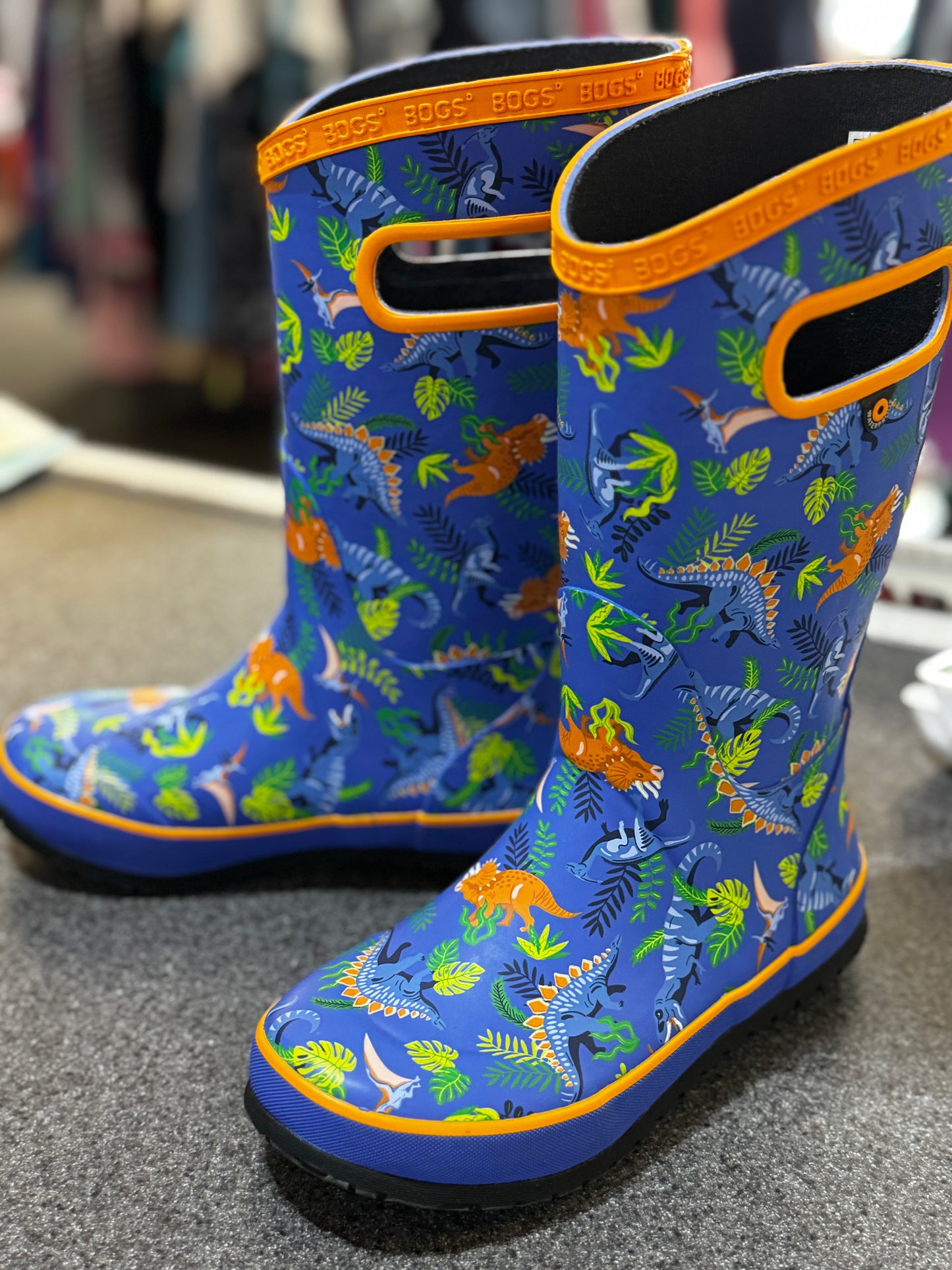 Bogs Kids' Skipper II Waterproof Rain Boots in the Dinosaur Jungle pattern size 1