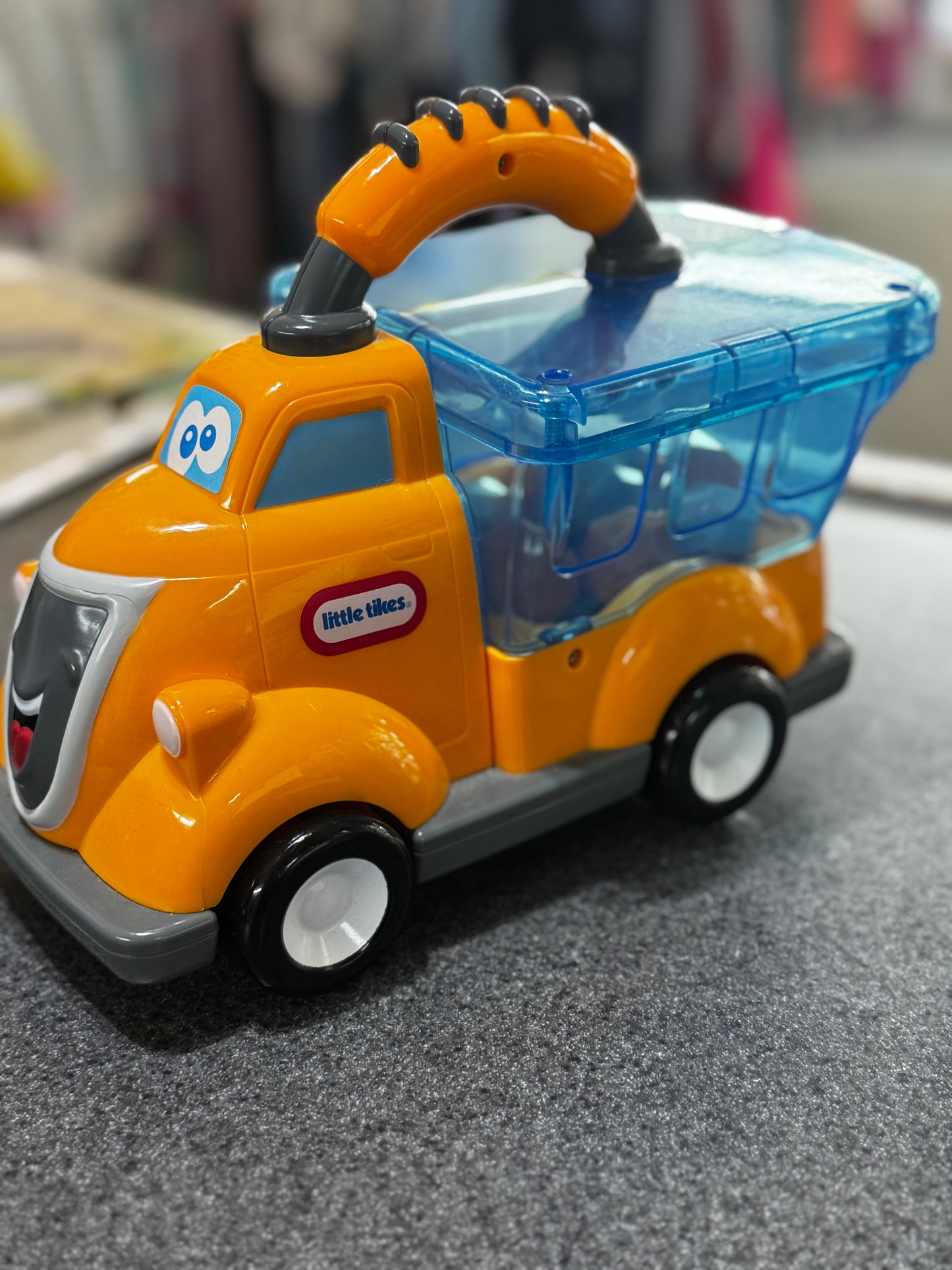 Little Tikes Pop Haulers Billy Boulder toy truck in orange