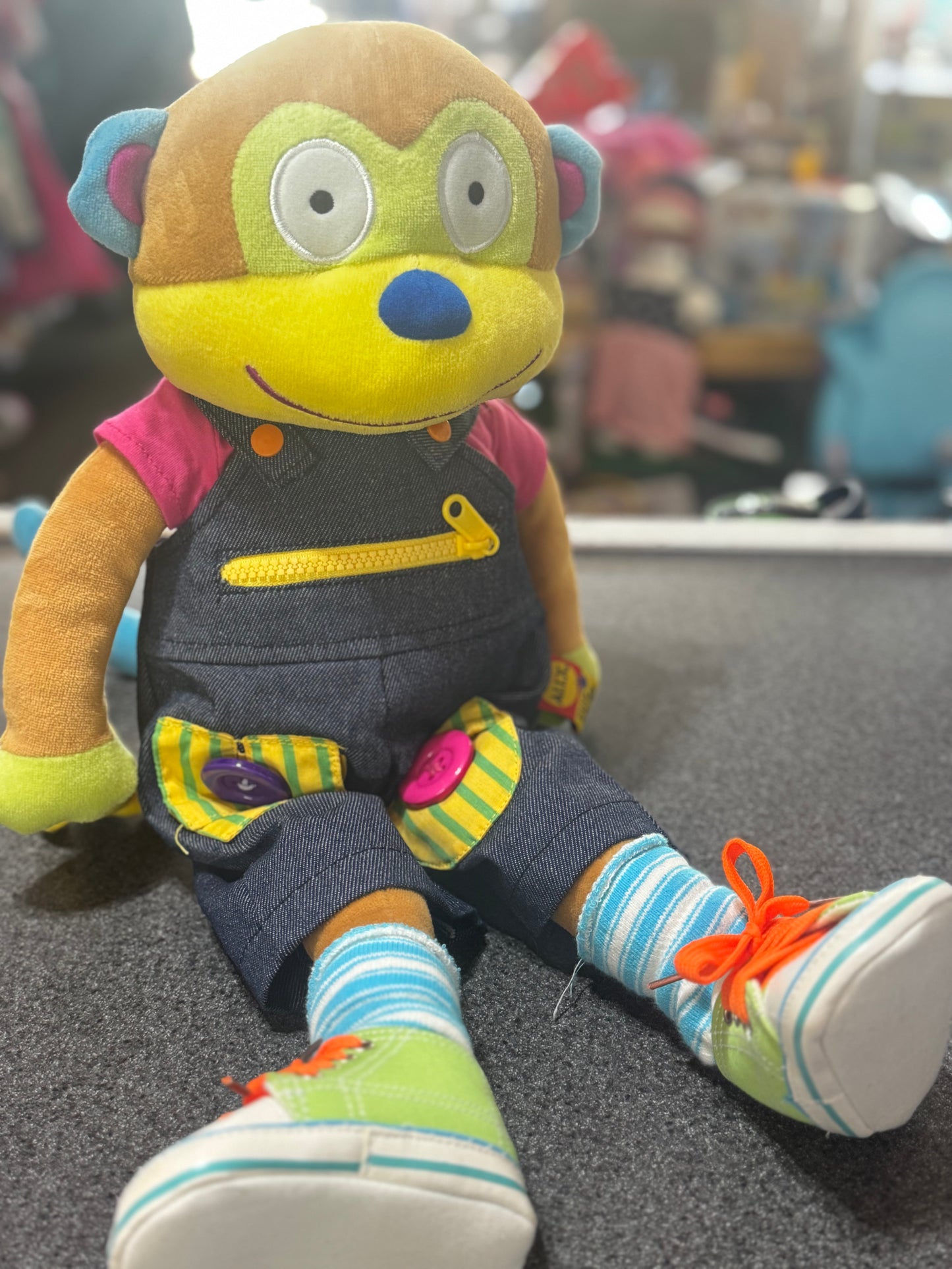 plush Alex Toys Little Hands Learn to Dress Monkey educational doll.