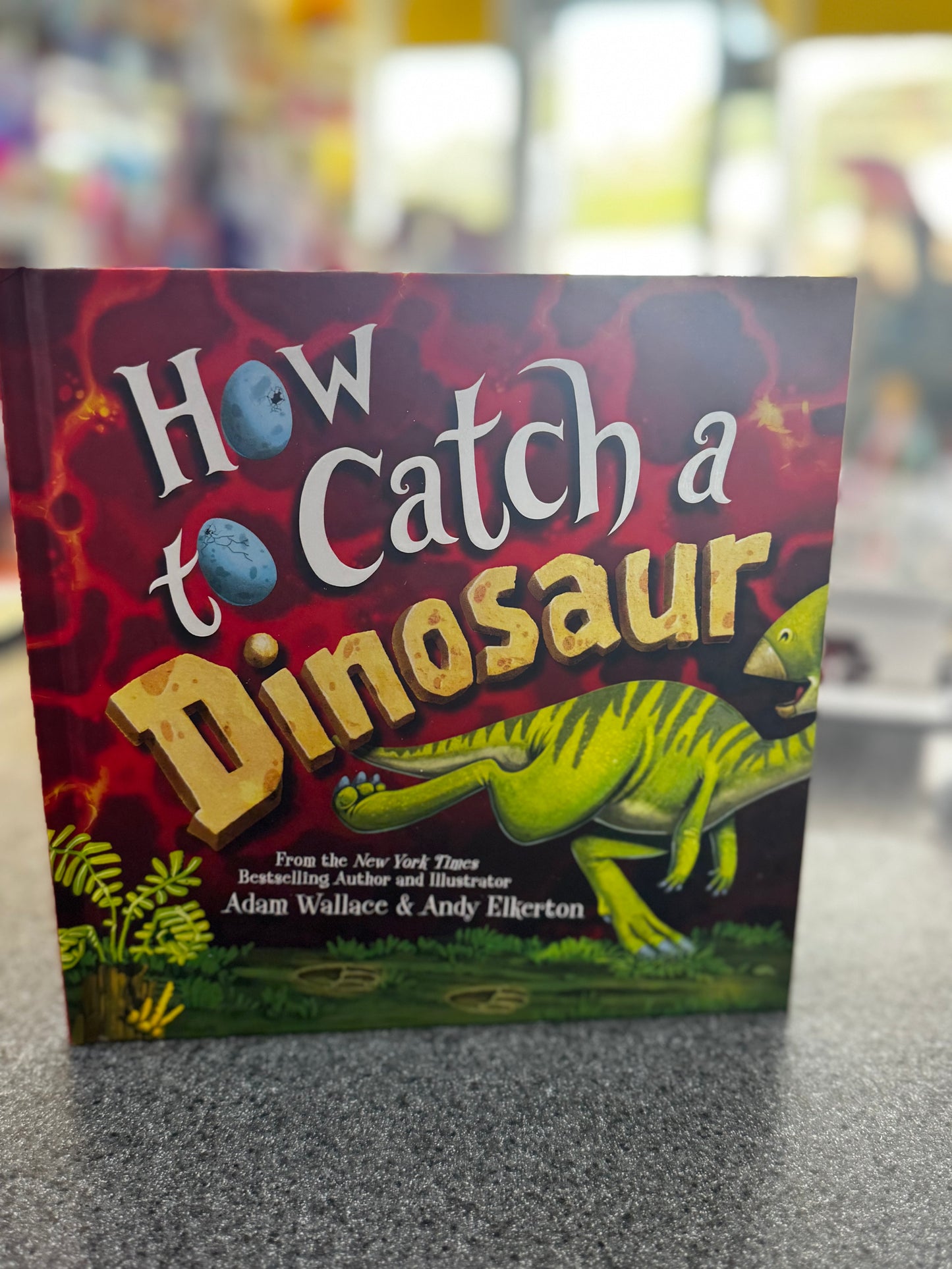 How to Catch a Dinosaur by Adam Wallace and illustrated by Andy Elkerton.