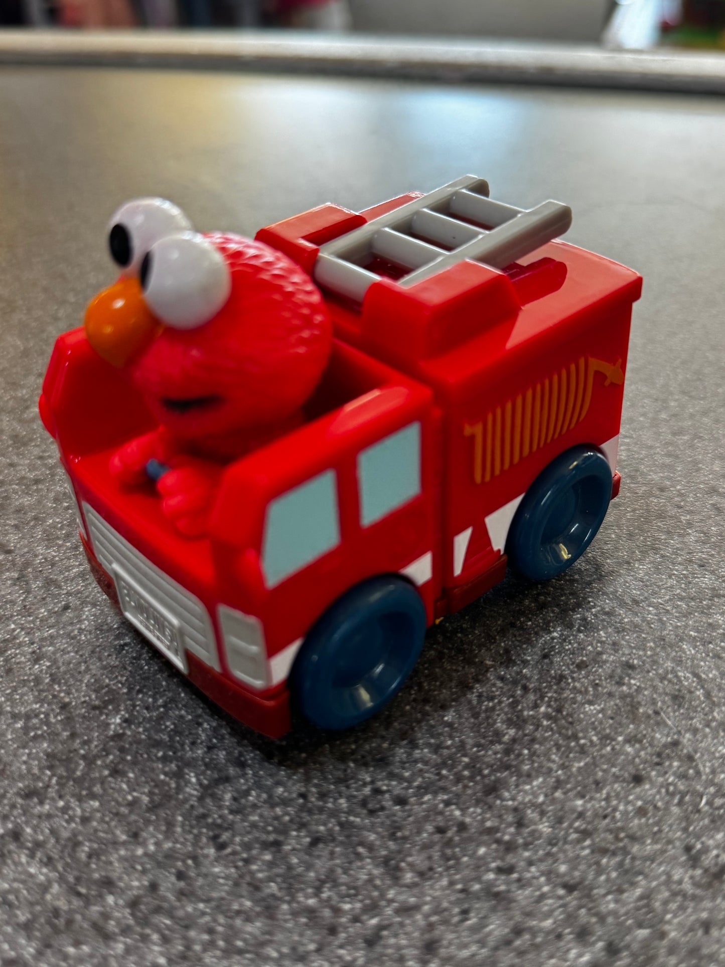 Sesame Street Twist & Pop Wheelies Elmo Vehicle