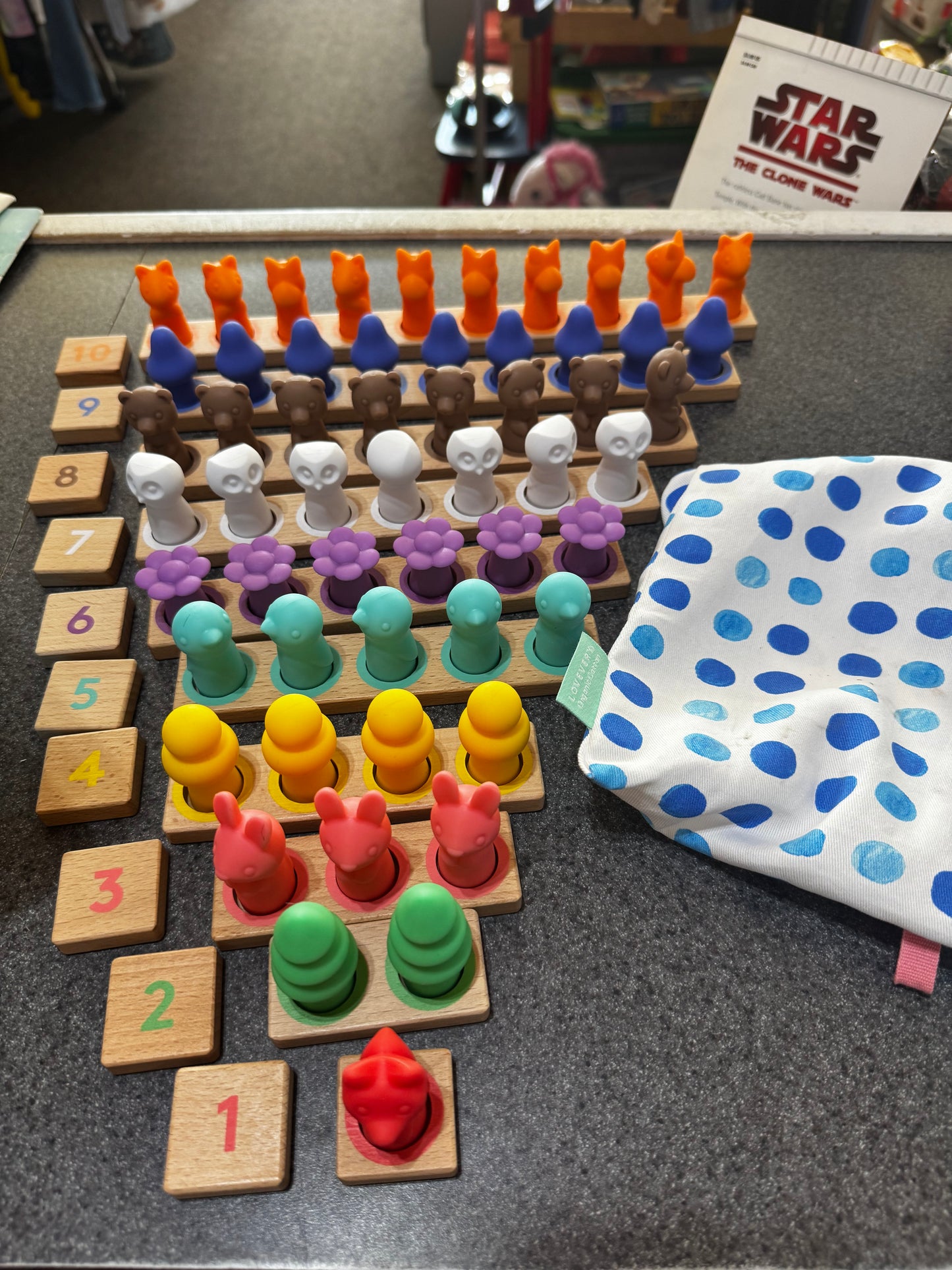 Lovevery Montessori Math Bars and Number Tiles with Nature Counters.