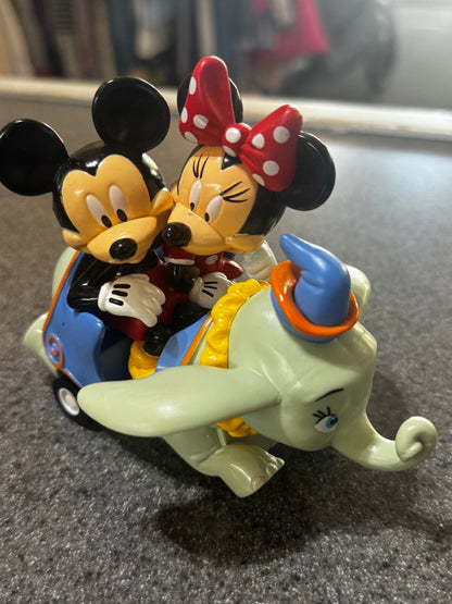 Disney Parks exclusive Mickey and Minnie Mouse Dumbo pull-back toy