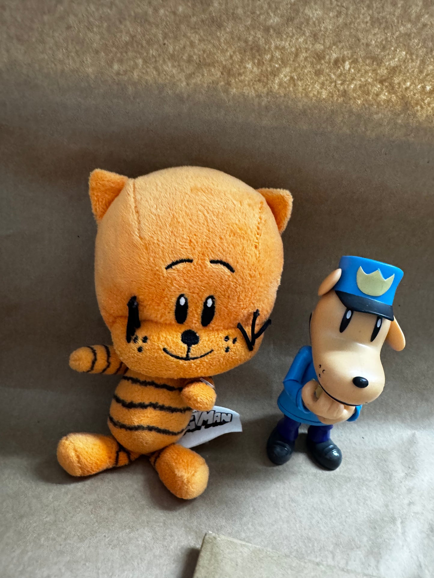 Dog man plush and action figure