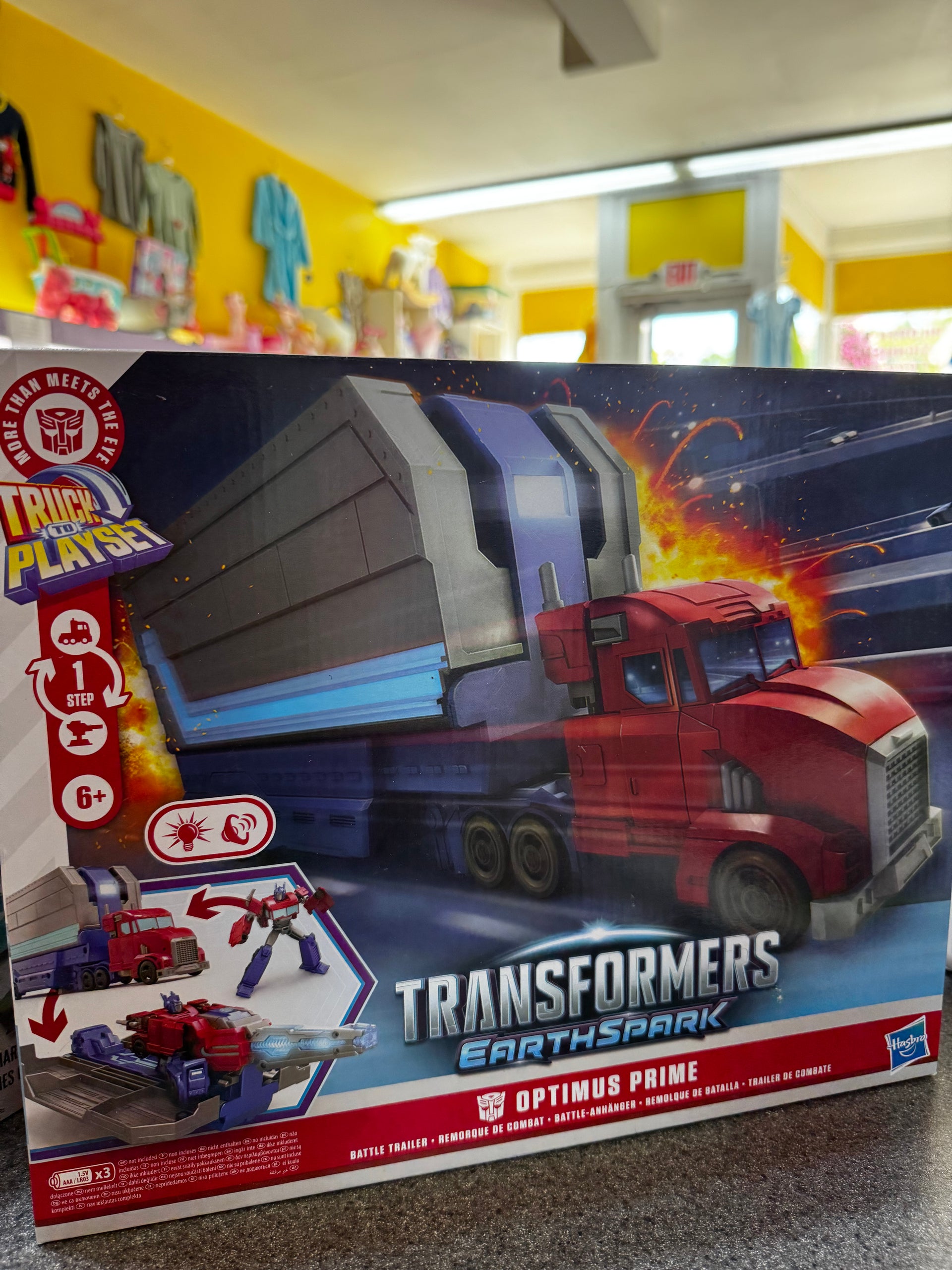 New~ Transformers EarthSpark Optimus Prime Battle Trailer Playset