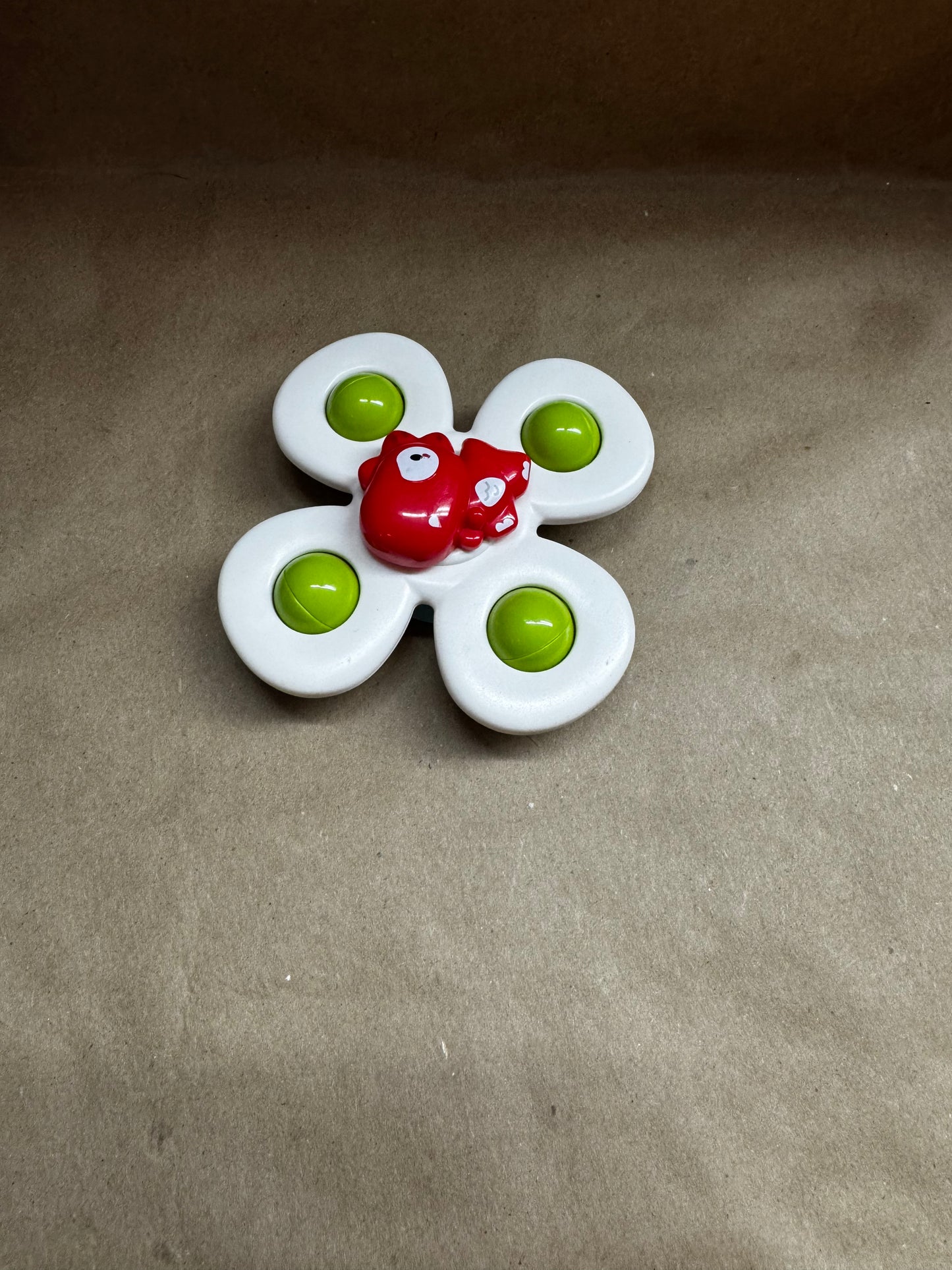Dino suction cup spinner toy