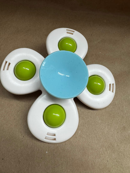 Dino suction cup spinner toy